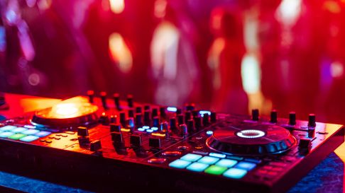 DJ turntable with colorful lighting